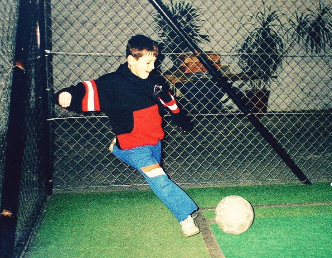Kid playing soccer