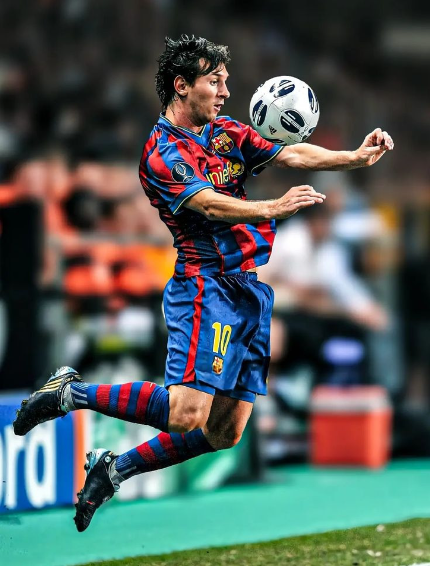 Adult chest-trapping the ball mid-air